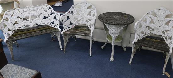 A three piece fern pattern bench set and table, Bench W.110cm